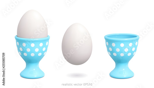 Schilderij op canvas Blue egg cup decorated with white polka dot