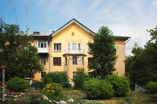 Antique style building in Ust-Kamenogorsk. Old building. Architectural background.