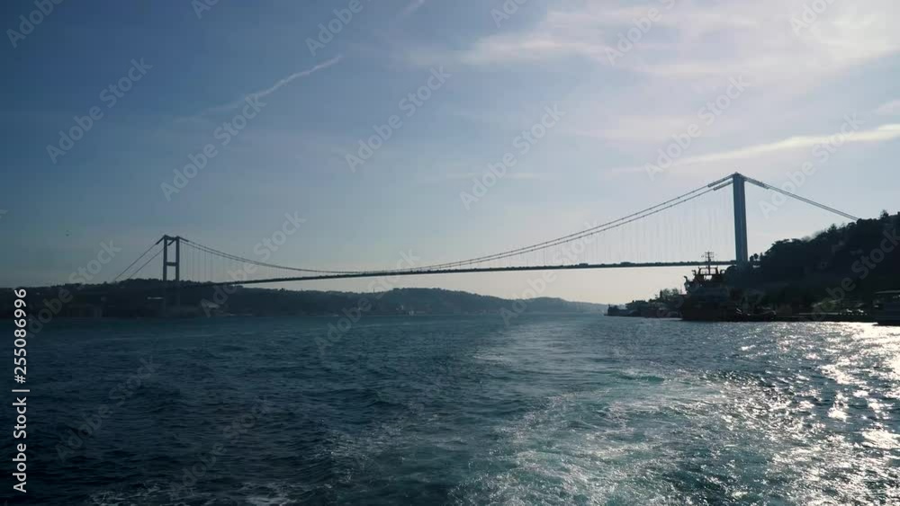 istanbul, Turkey - March 2019: Silhouette of Bosphorus bridge from a ferry boat, istanbul, Turkey istanbul, Turkey - March 2019: Silhouette of Bosphorus bridge from a ferry boat, istanbul, Turkey