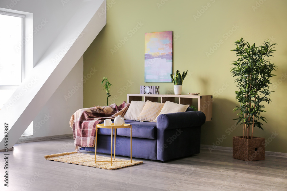 Fototapeta premium Interior of modern room with comfortable sofa