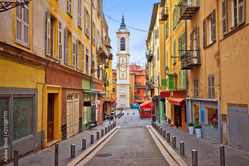 Town of Nice colorful street architecture and church view photo