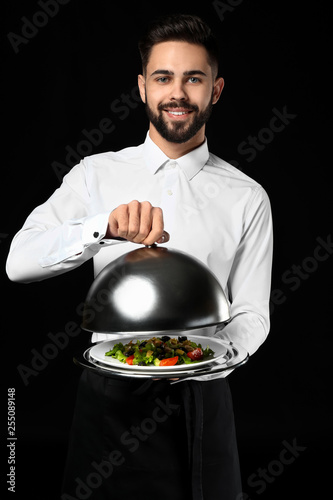 Handsome waiter with fresh ...