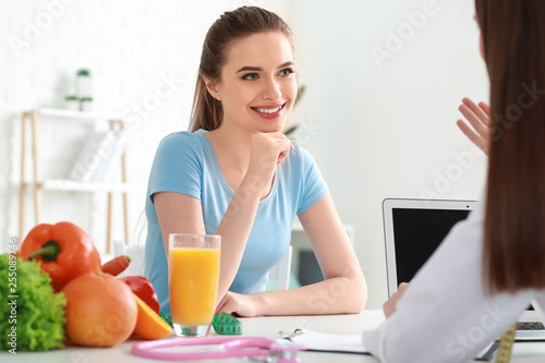 Young woman visiting nutrit...