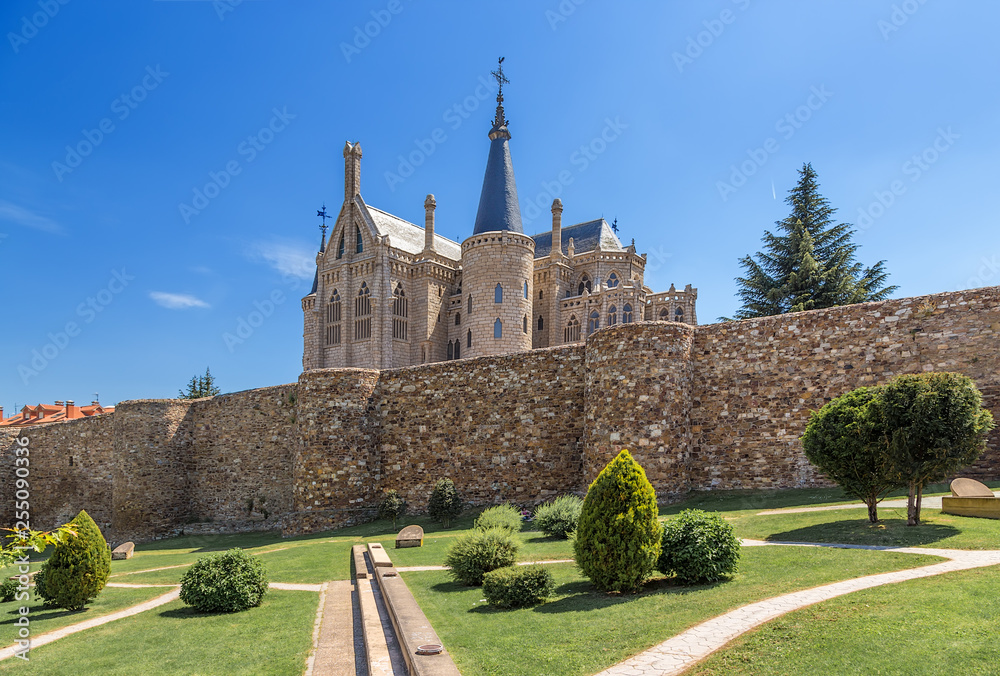 Astorga, Spain. The fortress wall (III - IV centuries) and the Episcopal Palace (architect Antonio Gaudi)