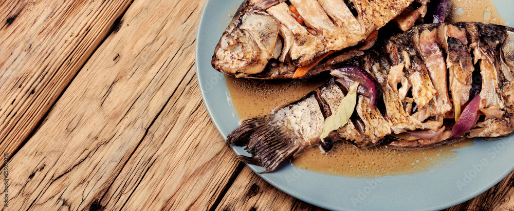 Tasty baked fish on plate Tasty baked fish on plate