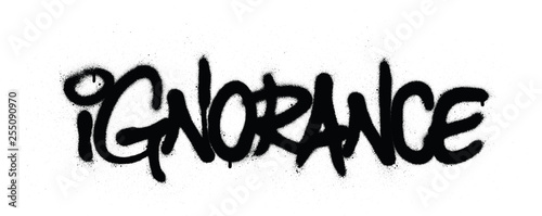 graffiti ignorance word sprayed in black over white