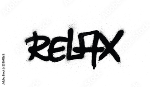 graffiti relax word sprayed in black over white