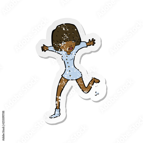 retro distressed sticker of a cartoon woman kicking off sock