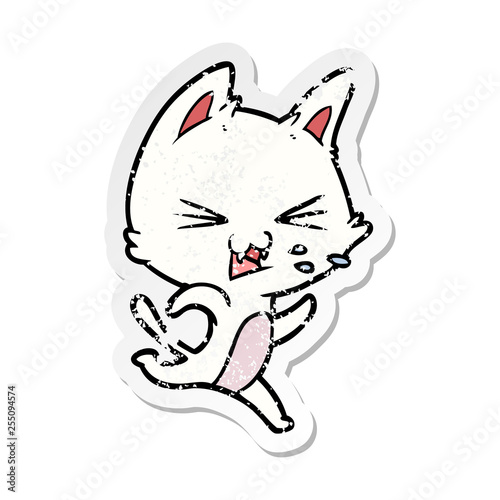 distressed sticker of a cartoon cat hissing