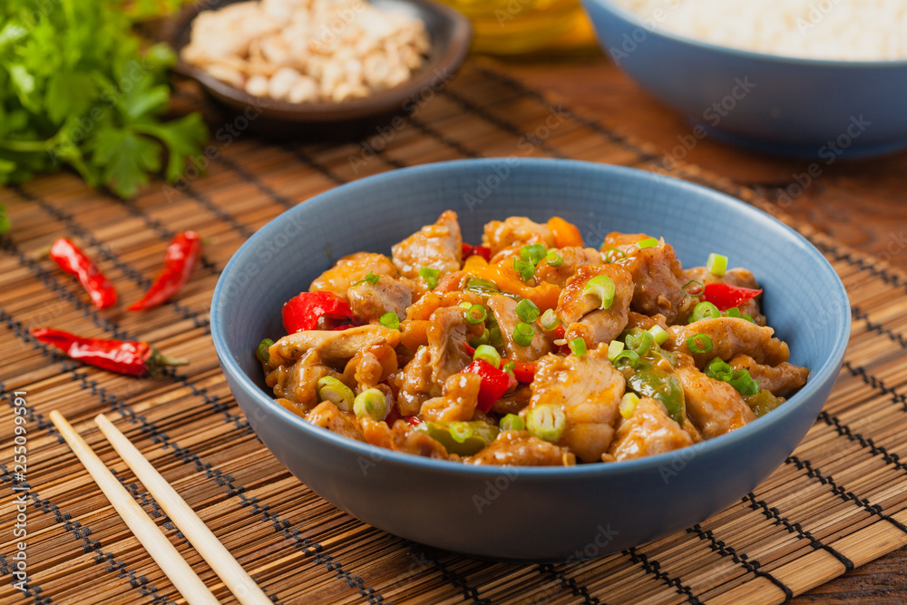 Chicken kung pao. Fried chicken pieces with peanuts and peppers. Chicken kung pao. Fried chicken pieces with peanuts and peppers.