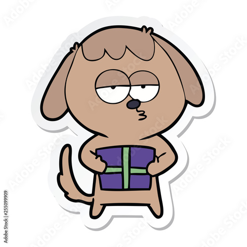 sticker of a cartoon bored dog with christmas present