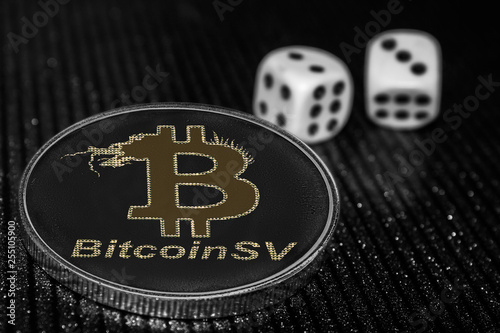 Coin cryptocurrency Bitcoin SV and rolling dice. BSV photo