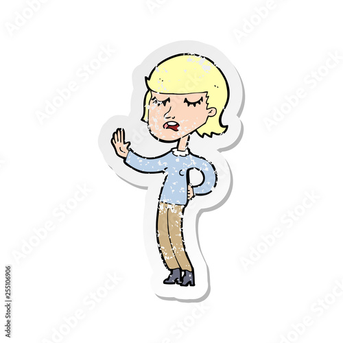 retro distressed sticker of a cartoon woman ignoring