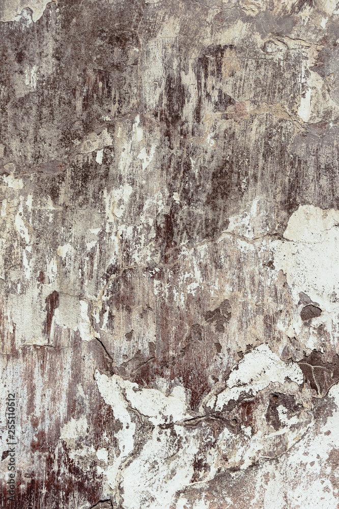 Cracked and peeling paint old wall background.