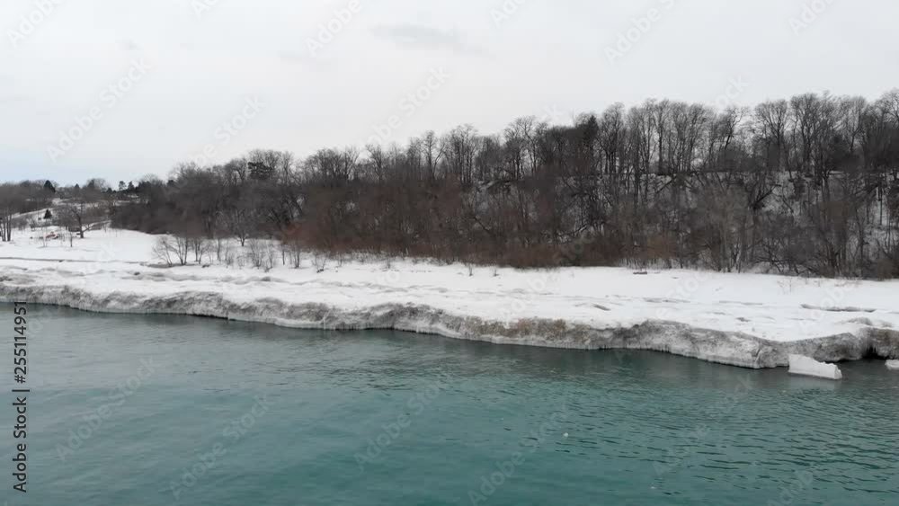 Michigan lake in Winter. Water, cold weather, bird's eye view, drone shots Michigan lake in Winter. Water, cold weather, bird's eye view, drone shots