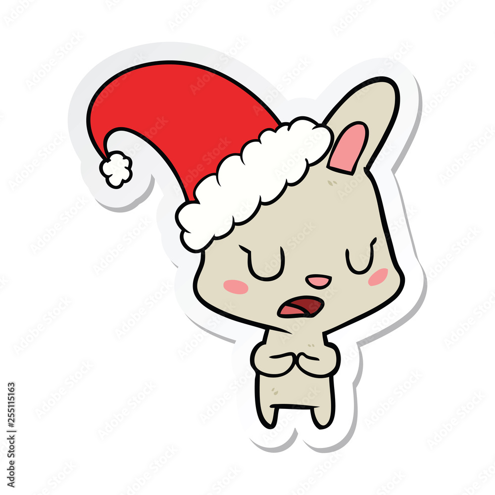 sticker of a cartoon rabbit wearing christmas hat sticker of a cartoon rabbit wearing christmas hat