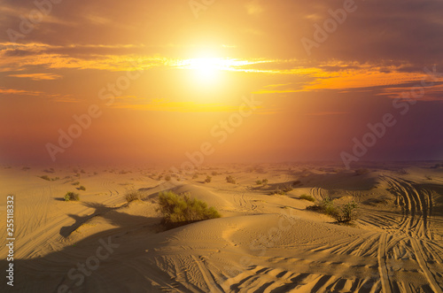 Deserts Driving outdoor, offroad car Sand Dunes Landscape at Sunrise