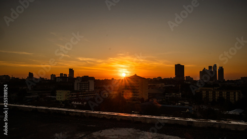 sunset over city © Nontoch