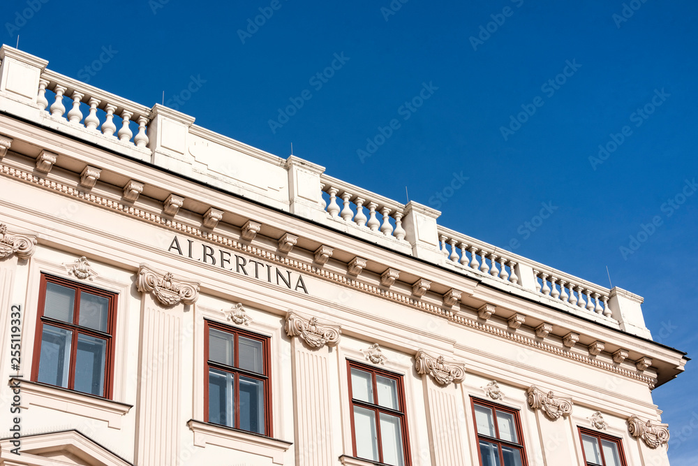 Austria, Vienna, Albrechtsplatz: Front view of world famous Albertina museum palais palace in the city center of the Austrian capital with blue sky - concept travel history art architecture Habsburger