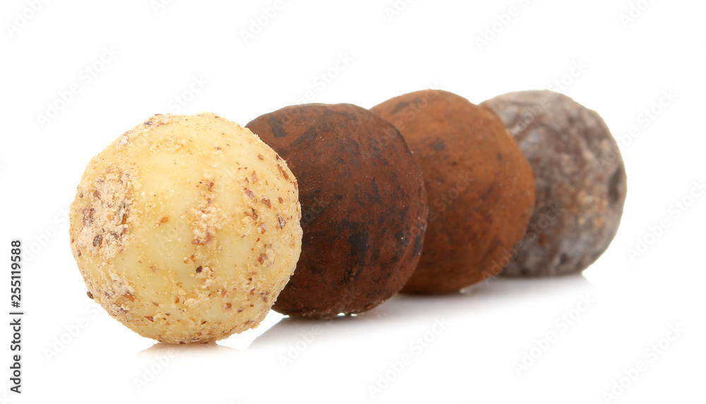 chocolate candies. candies of different chocolate on a white isolated background. close-up chocolate candies. candies of different chocolate on a white isolated background. close-up