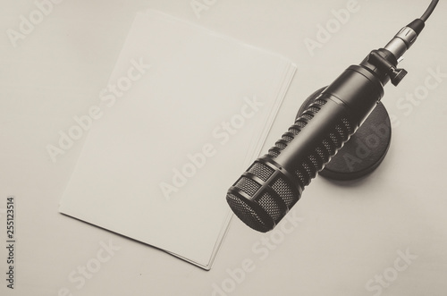 Professional microphone and empty paper