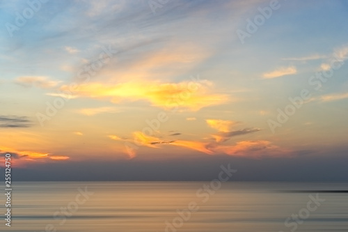 Background of colorful sky morning time. Sunrise on the beach and sea.