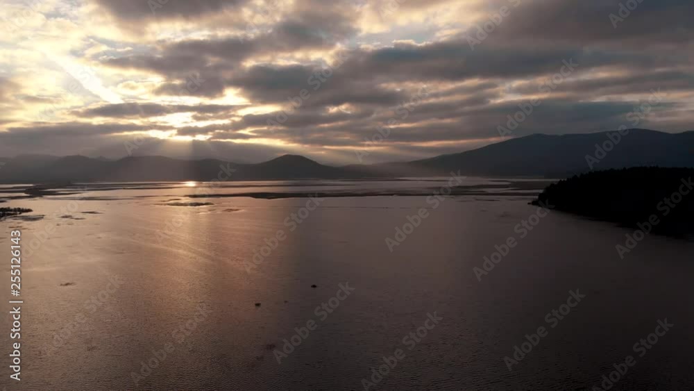 Aerial view of sunrise on the lake in Cerknica. Cerknisko jezero Aerial view of sunrise on the lake in Cerknica. Cerknisko jezero