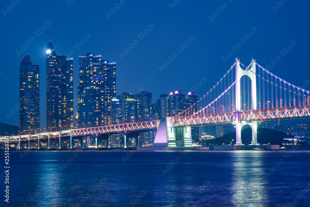 Fototapeta premium Gwangan Bridge and skyscrapers in the night. Busan, South Korea