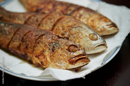 Grilled fish on paper 