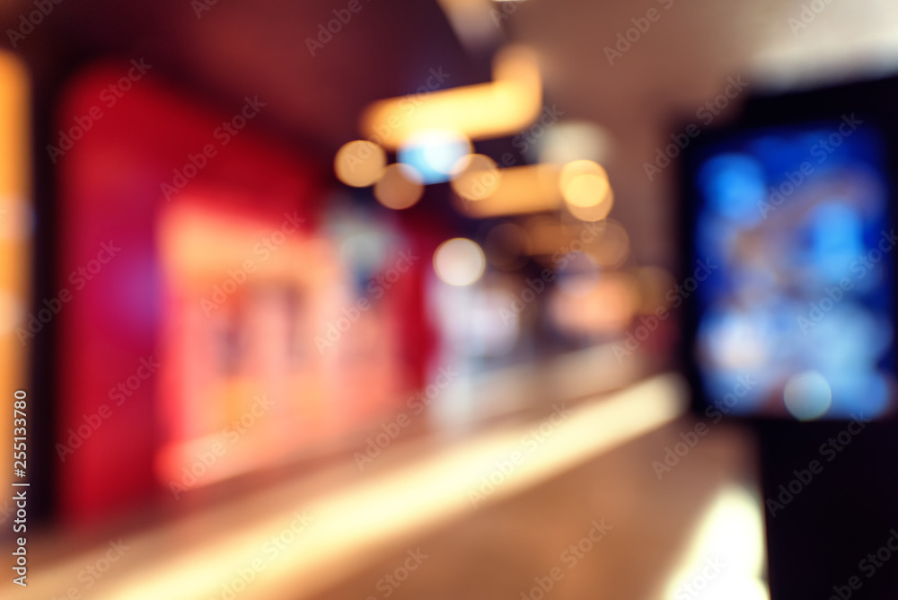 Blur inside shopping center building with bokeh light background, interior and mall background