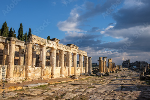 Pillars on a road in Hierapolis, Pamukkale, Turkey during sunset