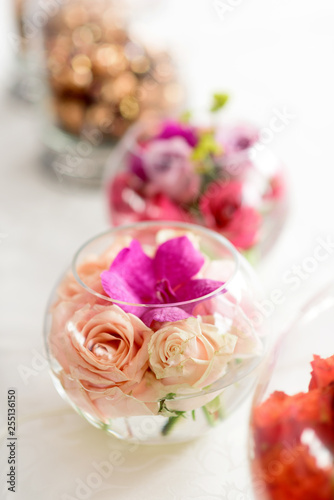Beautiful flowers in vase arrangement for tables