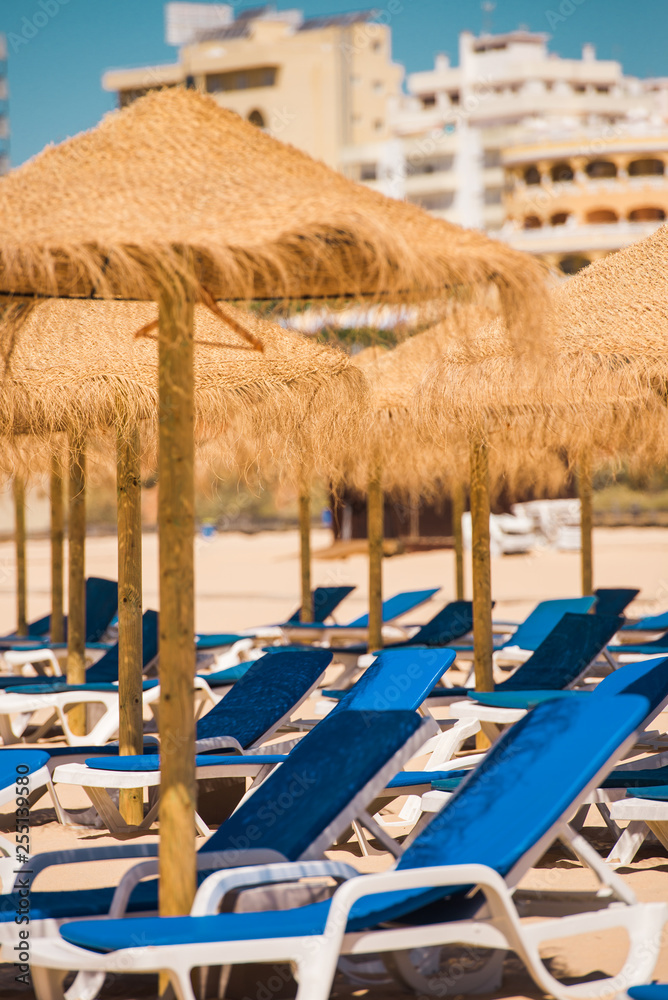 Chair and umbrella on a beautiful tropical beach