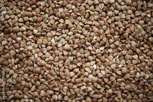 Buckwheat groats  brown background  groats brown texture