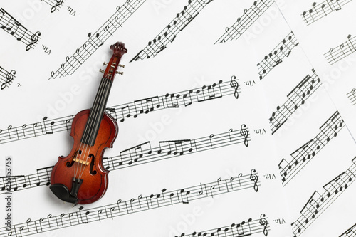 Violin on paper music notes with copy space