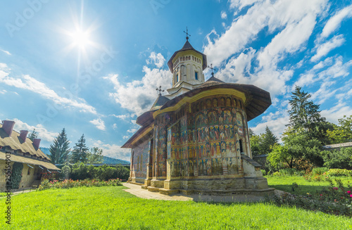 Vatra Moldoviței, Romania - May 2017:  Moldovita orthodox painted church monastery,  Moldavia, Bucovina, Romania photo