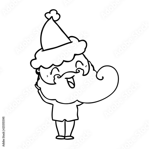 happy bearded man wearing santa hat