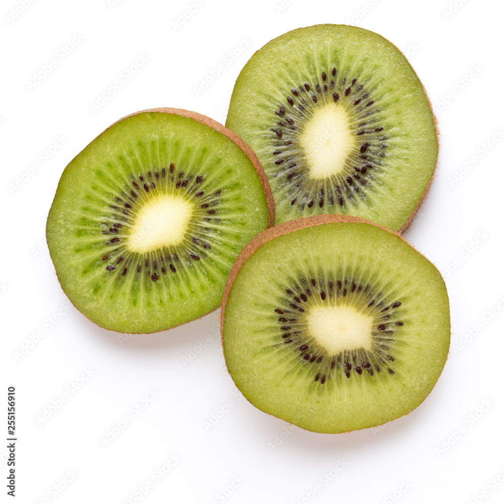 Kiwi fruit slices on white background. Kiwi fruit slices on white background.