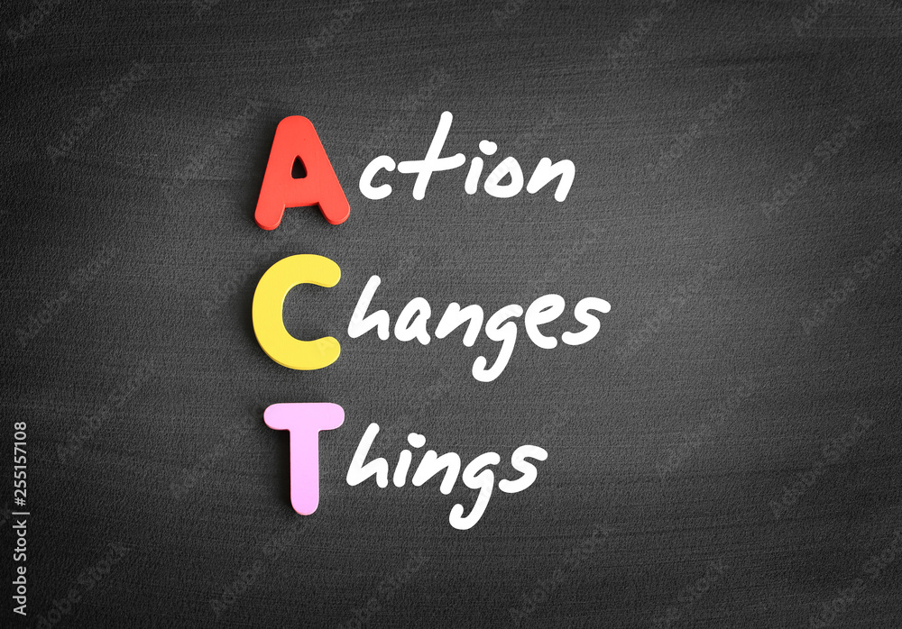 Obraz premium Color wooden alphabets building the word ACT - Action Changes Things acronym on blackboard