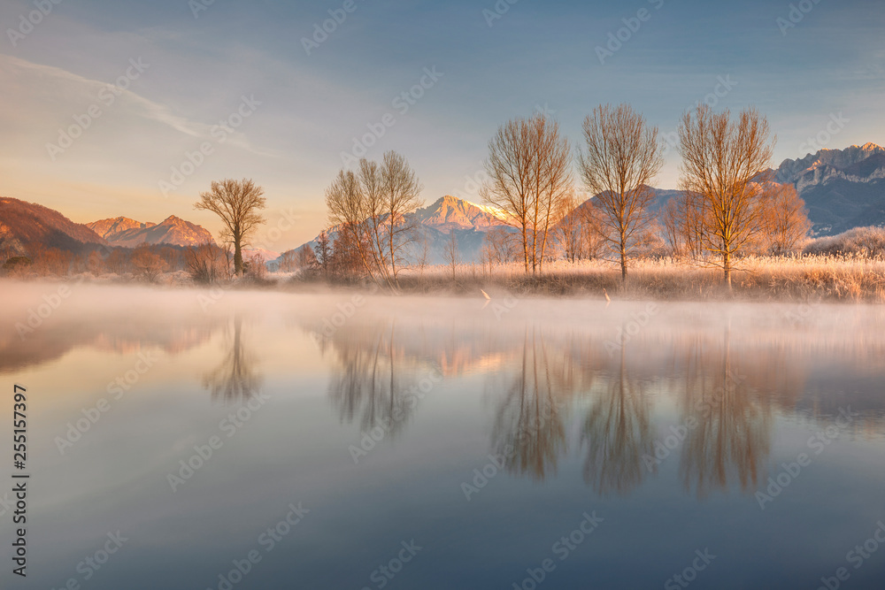Sunrise on Adda river, Airuno, Brianza, Lecco province, Lombardy, Italy, Europe Sunrise on Adda river, Airuno, Brianza, Lecco province, Lombardy, Italy, Europe