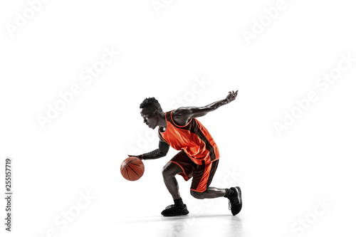 Full length portrait of a basketball player with a ball isolated on white studio background. advertising concept. Fit african anerican athlete with ball. Motion, activity, movement concepts.