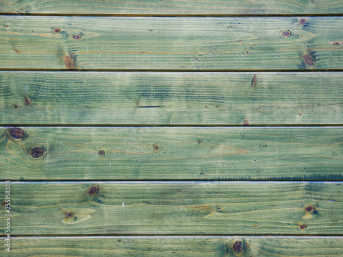 Horizontal green pine boards close up shot, image for background.