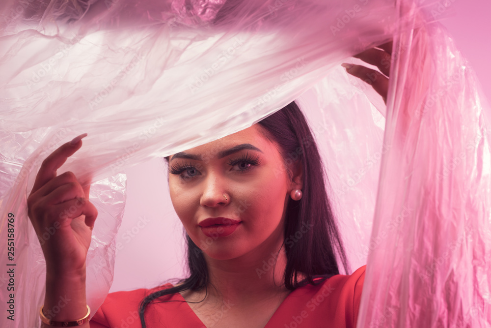 Fototapeta premium portrait of young woman with bad habits 