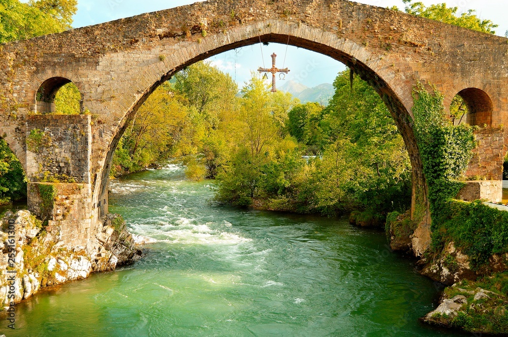 Roman bridge with Victory Cross on Sella river, Cangas de Onis, Asturias (Spain).