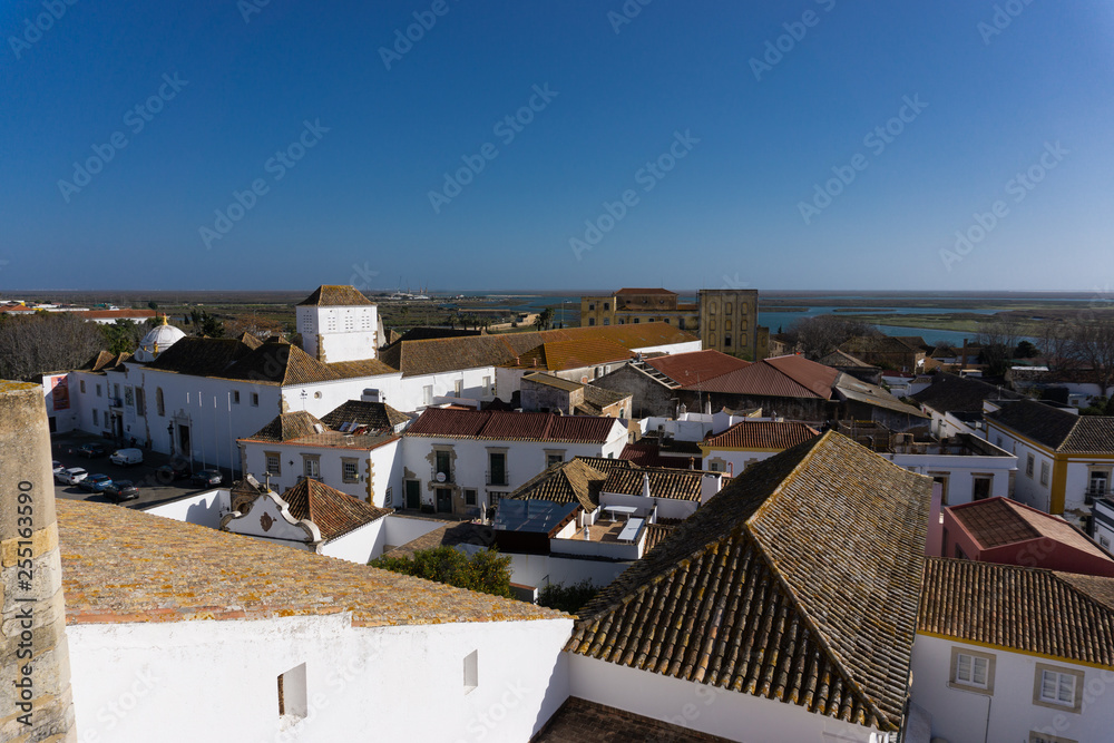 View of rooftops Faro Portugal and ria formosa lagoon