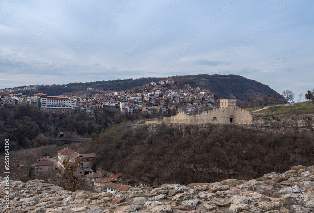 Beautiful panoramic view from Tsarevets fortress to the old town of Veliko Tarnovo and medieval Trapezitsa Fortress in Bulgaria. Panorama