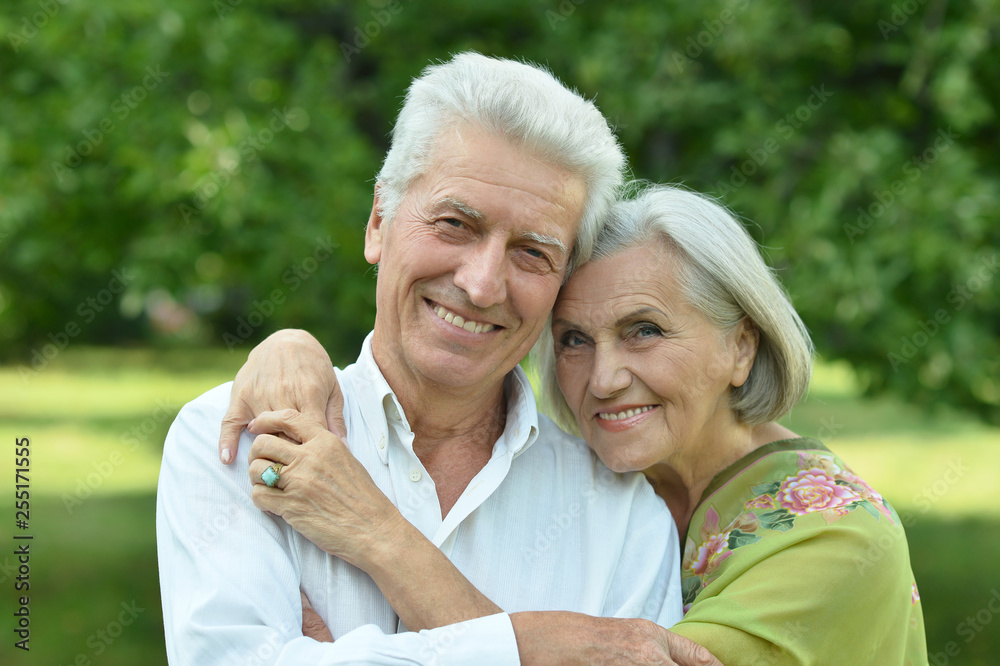 Portrait of mature couple in summer park Portrait of mature couple in summer park