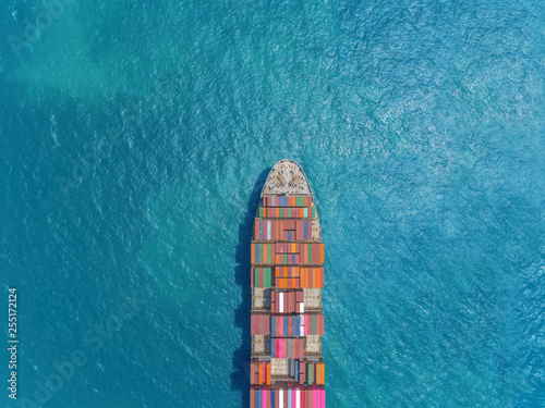 Aerial top view container ship on the sea full load container for logistics, import export, shipping or transportation.