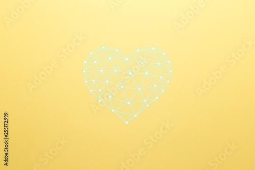 Concept of neural network with heart on the yellowl background. Artificial intelligence, machine and deep learning, neural networks and another modern technologies. New minimal creative concept photo