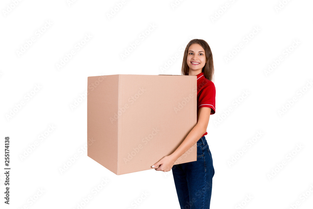 Friendly young delivey girl brings a big parcel for a customer isolated on white background Friendly young delivey girl brings a big parcel for a customer isolated on white background
